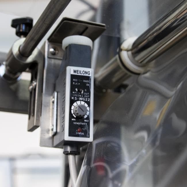 Машина для упаковки трудно-сыпучих продуктов и порошков Hualian Machinery DXDF-1000A