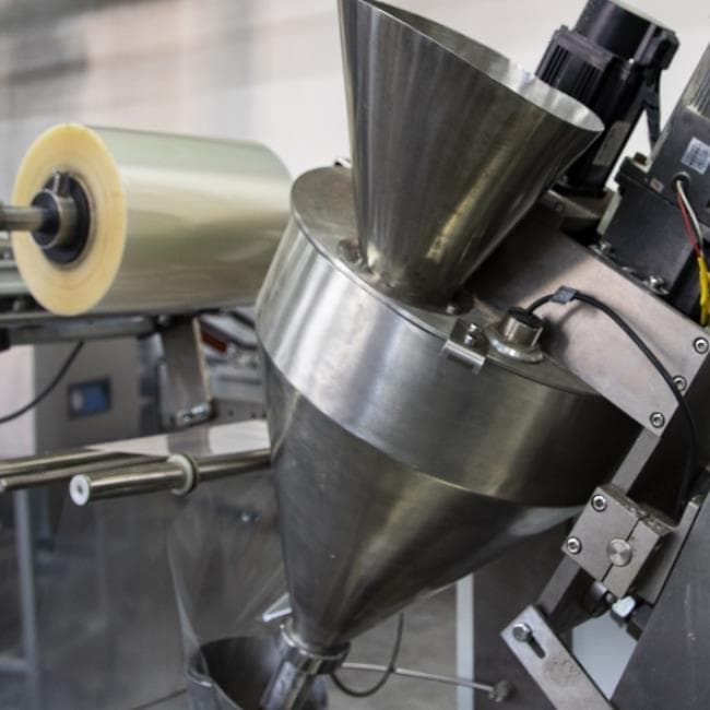 Машина для упаковки трудно-сыпучих продуктов и порошков Hualian Machinery DXDF-500A