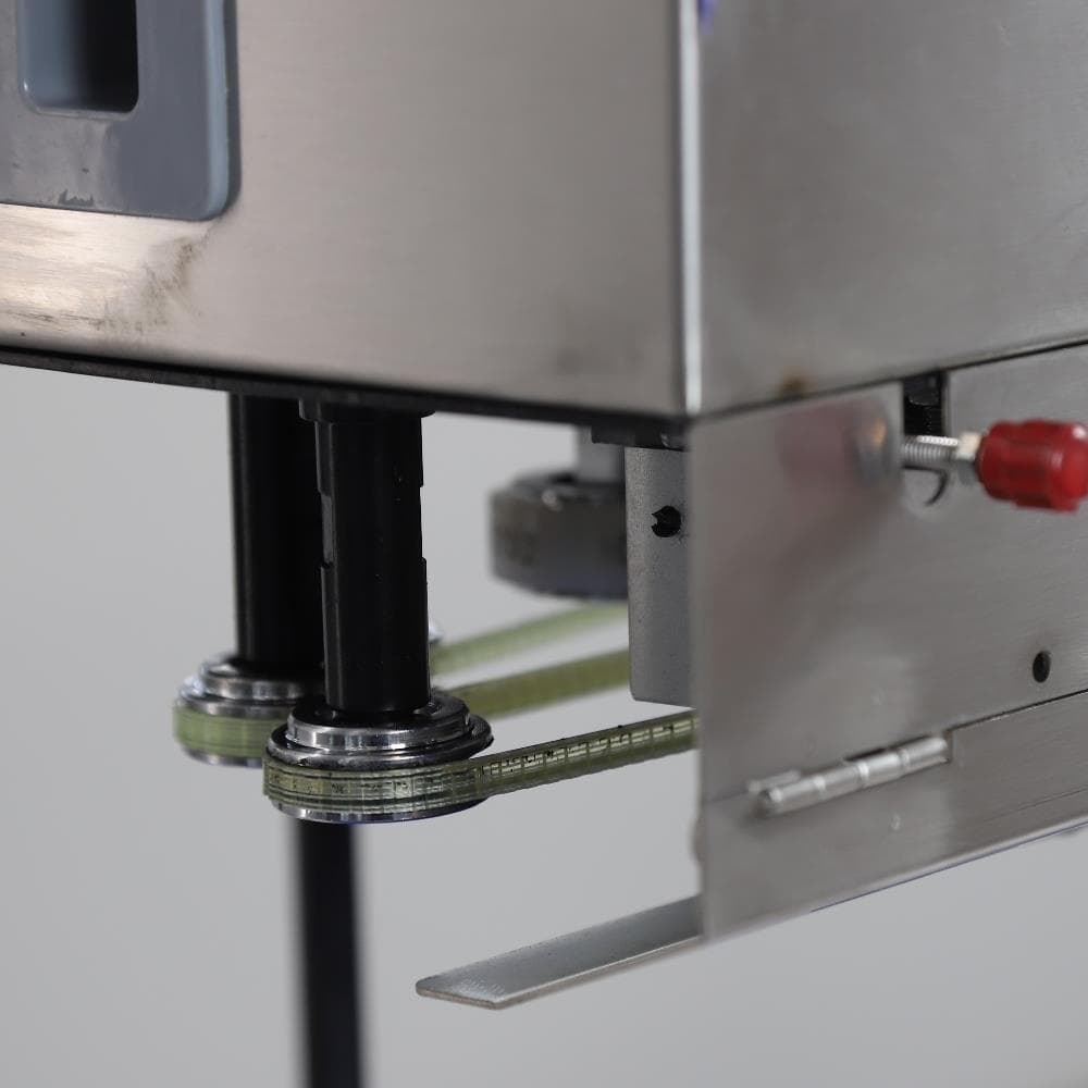 Роликовый конвейерный запайщик вертикальный Hualian Machinery FRBM-810II SS нерж