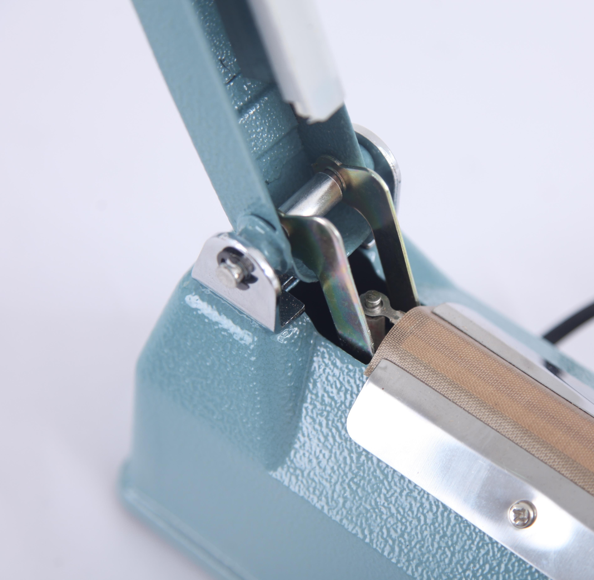 Ручной импульсный запайщик пакетов Hualian Machinery FS-200 IRON Lite металл